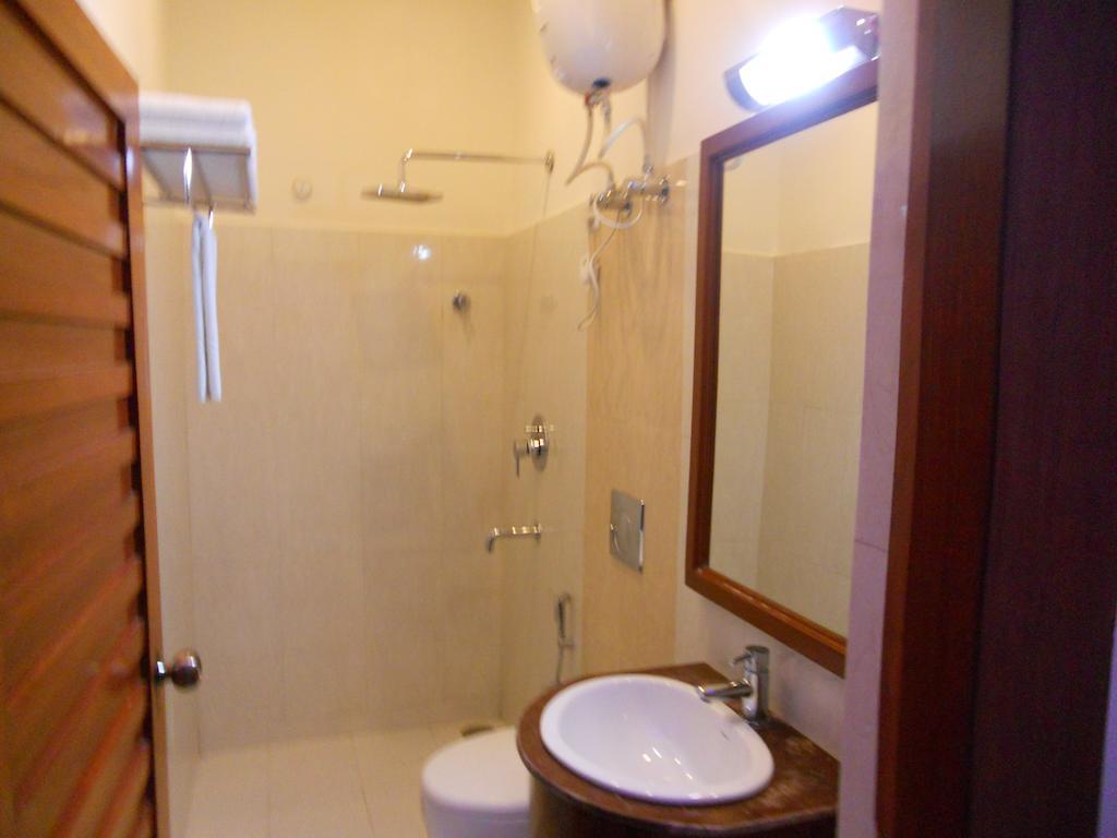 Отель Prayag Aristro Club Калькутта Номер фото